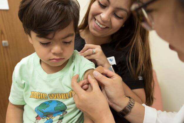 Child receiving check-up