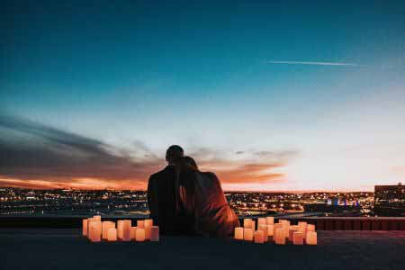 Husband and wife watching the sunset