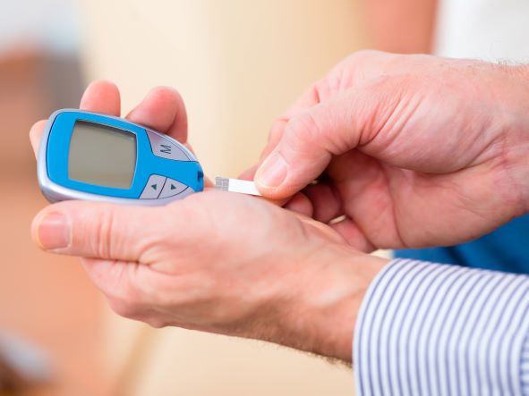 Person checking their blood pressure