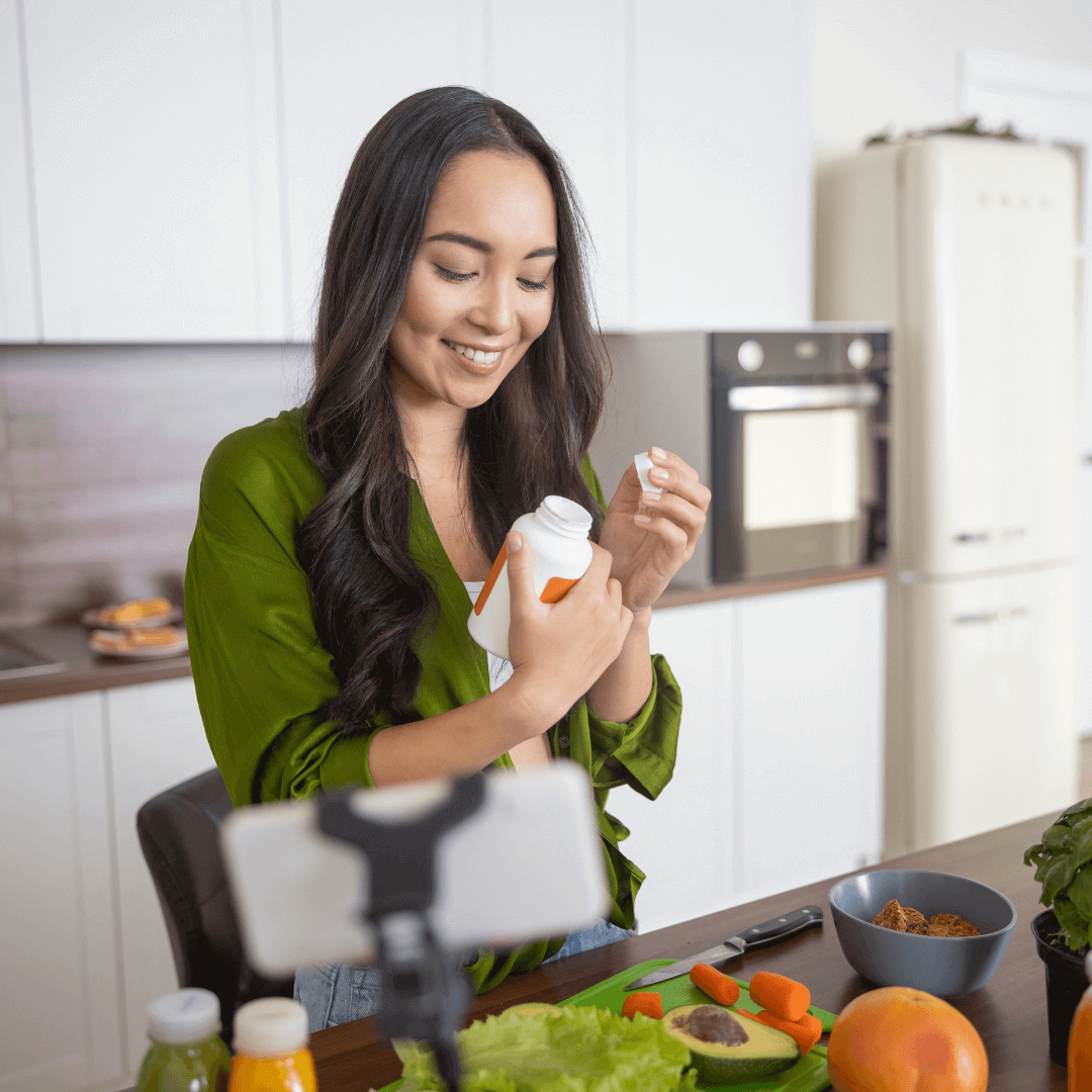 woman holding vitamins