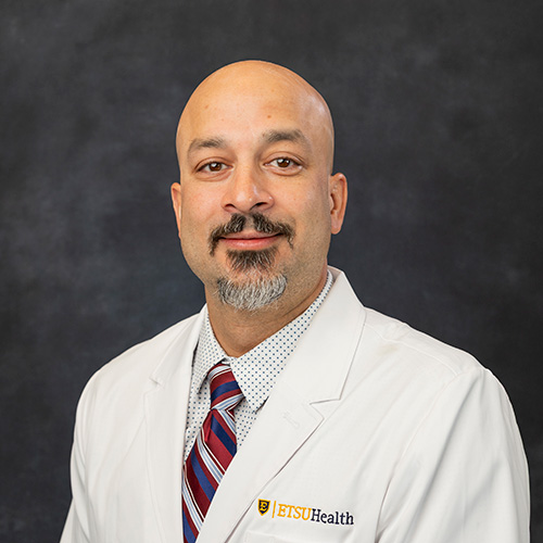 Portrait of Corey Iqbal, M.D