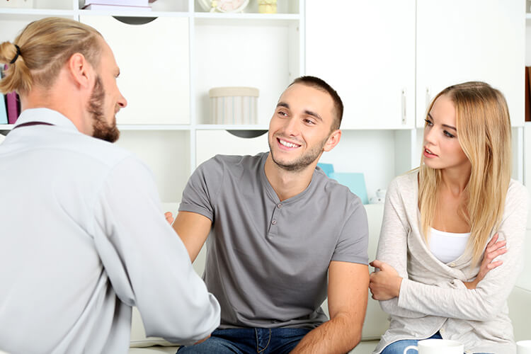 Provider meeting with man and woman